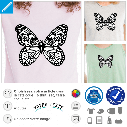 Papillon noir et blanc aux motifs graphiques et lignes entrelaces sur les ailes arrondies.