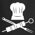 Chef pirate, un design pour la cuisine avec brochette et couverts croiss sous une toque.